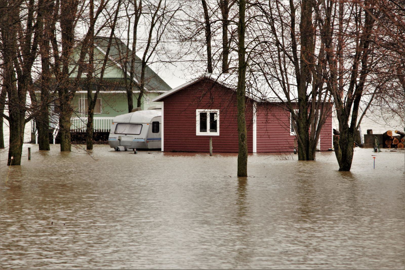 Home surrounded by standing floodwater needing emergency water removal in Las Vegas