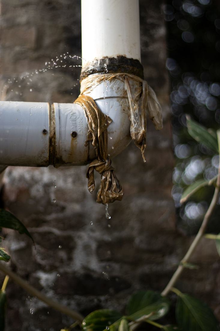 Leaking pipe joint dripping water, the kind of failure that needs 24 hour water damage help in Las Vegas